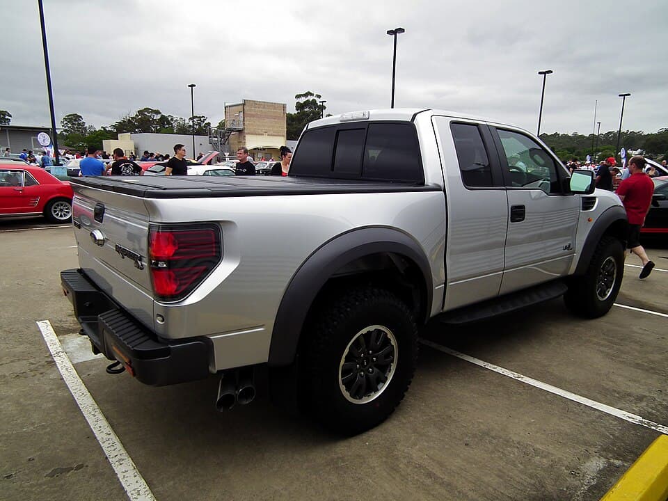 2012 SVT Raptor SuperCab in silver, rear three-quarter in an Australian car park at the 2013 NSW All American Day.