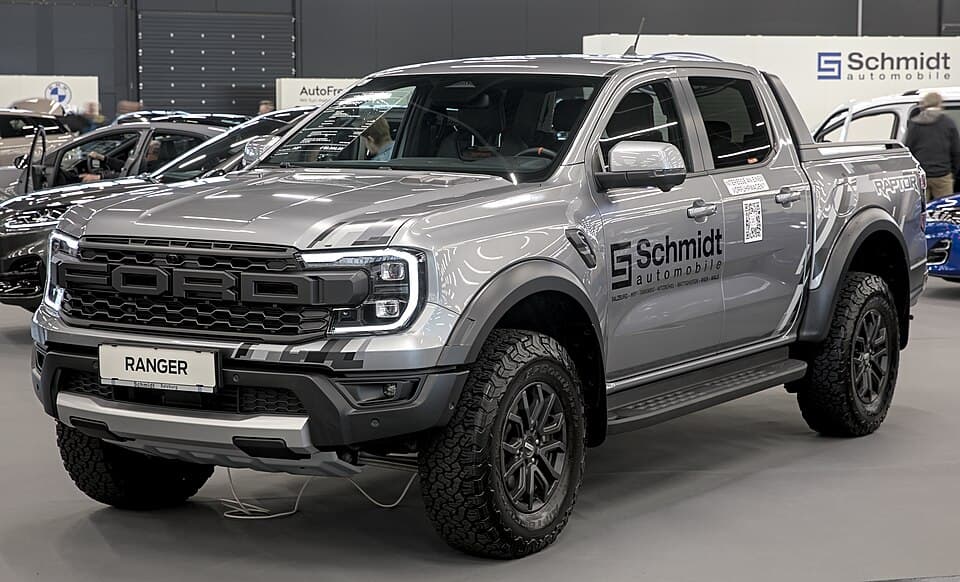 Silver Ranger Raptor (P703) on a stand at Automesse Salzburg 2023, front three-quarter on the factory wheel and tyre package.